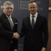 Slovenský premiér Robert Fico a maďarský minister zahraničných vecí Péter Szijjá...